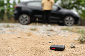 Lost car keys on the ground, Car keys dropped on the floor or fall lying on the street home front. Walking Away From Lost Car Key, can not transport, express, rush time, wast time, emergency