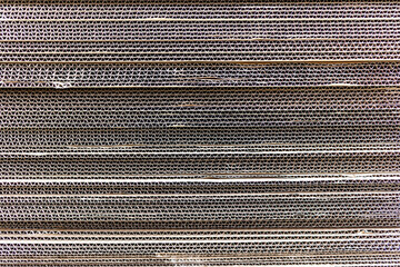 Image of stacked cardboard boxes taken from the side