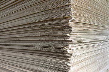 Image of stacked cardboard boxes taken from the side