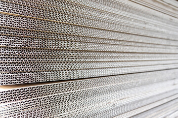 Image of stacked cardboard boxes taken from the side