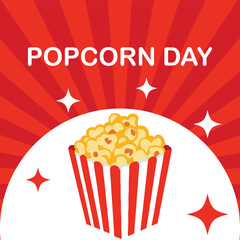 Festive red and white striped bucket overflowing with delicious popcorn celebrating national popcorn day event