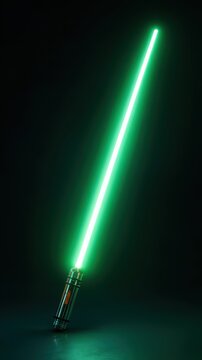 A glowing green lightsaber with a metallic hilt rests on a reflective surface against a dark, subtly lit background.