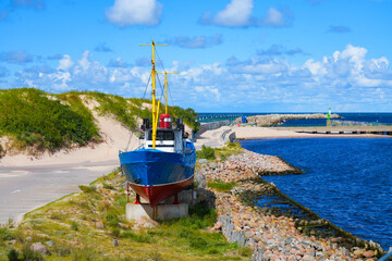 Retired fishing boat Azova displayed near the South Pier in Ventspils, Latvia - Maritime exhibit on the coast of the Baltic Sea