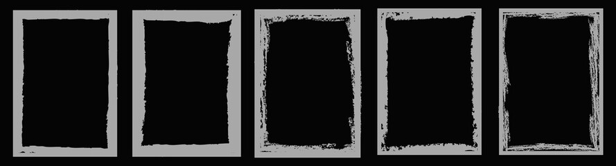 Monochrome distressed rectangular frames stacked vertically with rough textured borders on black background. Realistic texture borders or frames for posters.