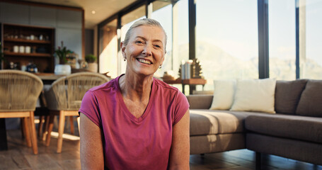Fitness, portrait or mature woman in house with smile, pride or rest after physical activity. Happy, wellness or female person in home with confidence, senior hobby or workout break in Australia. © OnPoint/peopleimages.com