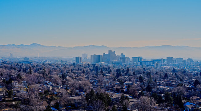 Aerial view of the City of Reno and Sparks covered in a smoggy haze during a temperature inversion.