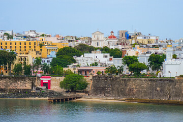 Obraz premium Panoramic view of Old San Juan with the historic cathedral and colonial city walls in Puerto Rico