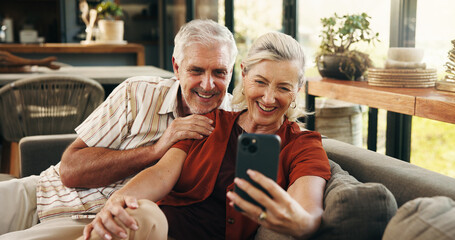 Video call, smile or old couple in home with phone, connection or online conversation in living room. Happy, senior man or woman with tech, digital communication or bonding together on virtual app.