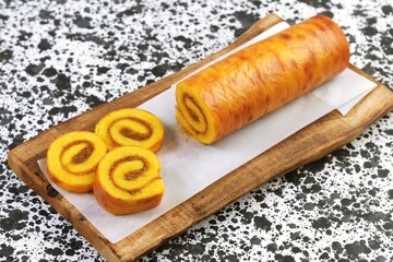Slice Pineapple Roll Cake or Bolu Gulung Nanas, Thin Cake Rolled with PIneapple Jam 