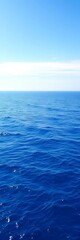Obraz premium Vast, tranquil blue ocean under a clear sky, peaceful, calming, azure, sky