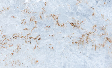 Obraz premium Thin ice crystalline structure with sand, natural background texture, macro photo