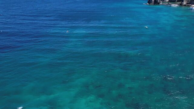 Apo Island from above. Cinematic footage of the best diving spot in the Philippines. 