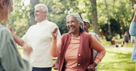 Fototapeta premium Woman, happy and old people in park with fitness, class and nature for senior exercise club. Retirement, hobby and personal trainer with mature group, outdoor or workout for health and wellness