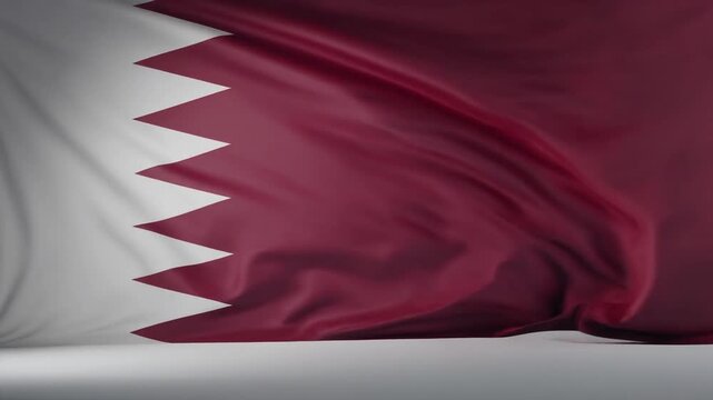 Wavy flag of qatar in maroon and white colors. Suitable for national celebrations, presentations, or educational materials related to qatar.
