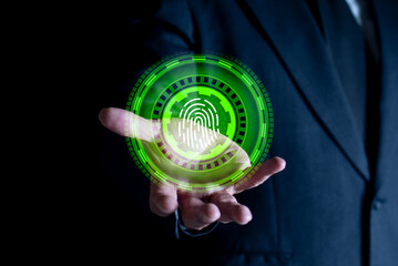Businessman holding virtual finger print digital screen, biometric encryption for cybersecurity network and user security concept.