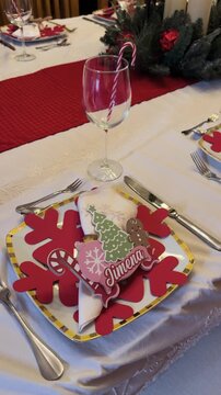 Christmas dining table set with decor on plates