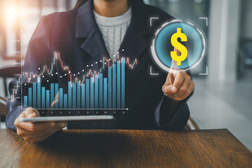 Professional woman interacting with financial graphs and dollar symbol, representing business growth and investment.