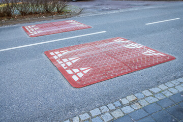 Slowing retarder, speed humps - raised surfaces in urban area forcing drivers to drive slowly.