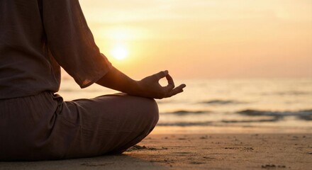 Peaceful Mindfulness: Woman Practicing Yoga and Meditation by the Ocean © Captured Blinks