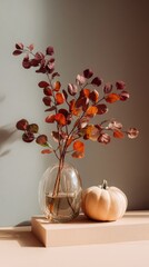 Elegant glass vase with sculptural branch and autumn accent decor