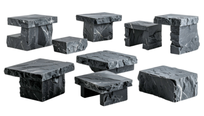 Nine gray, stacked, stone structures with varied heights and geometric shapes