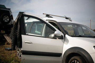 jacket hanging on a car door