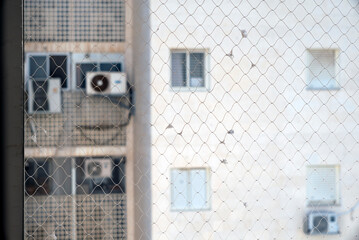 anti birds net on a balcony