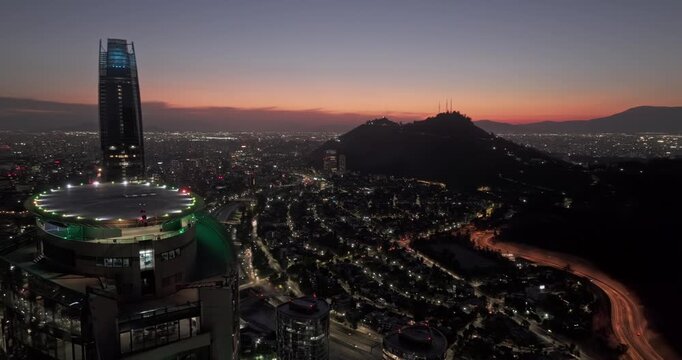 Santiago Chile Aerial v25 flyover Las Condes around Torre Titanium capturing panoramic views of downtown cityscape, river and hillside landscape at dusk - Shot with Mavic 3 Pro Cine - Jan 20th 2025