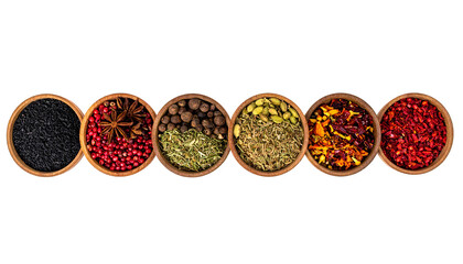 Row of small, round, brown bowls filled with various dried colorful spices on black