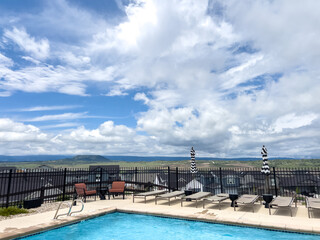 Cloudy Sky Over Scenic Pool Deck