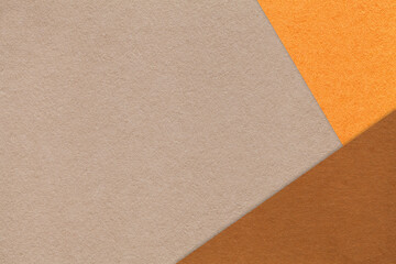 Fototapeta premium Abstract warm beige, orange and brown paper background with copy space. Template for presentation, banner, card design