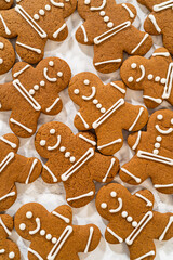 Decorating Gingerbread Man Cookies with Royal Icing for Festive Occasions