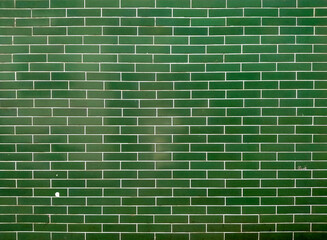  Glossy green ceramic subway tiles wall texture background © Parichart