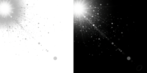A dramatic black and white image of two bright lights shining in a dark space with sparkling particles
