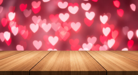 Empty wooden table in front of pink heat shape blurred valentine day light background for product display in a coffee shop, local market or bar