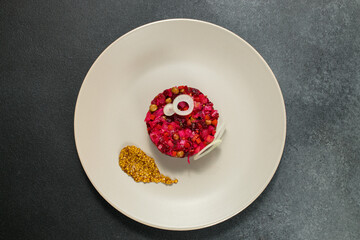 Classic Russian Beet Salad with Mustard Seeds on Plate. Vinaigrette