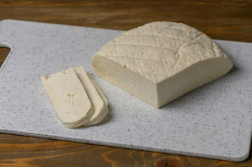 Fresh Sulguni Cheese on Rustic Kitchen Table