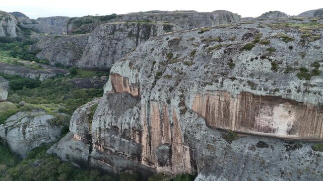 close up drone of the sacred black rocks at Pungo Andongo, Malanje, Angola, Africa, rising from the lush tropical plateau