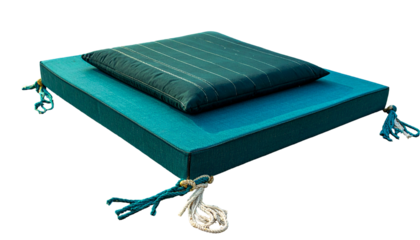 Turquoise cushion and pillow set, rope detail, close-up, top view