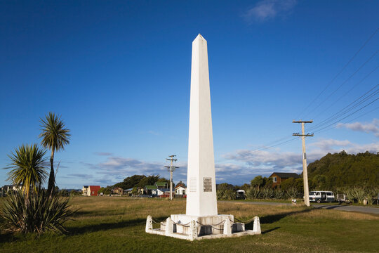 Abel Tasman Monument obelisk in Okarito, New Zealand on a clear day