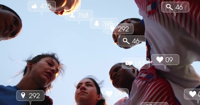 Women initiating soccer huddle pep talk summoning rising social media icons overhead fading