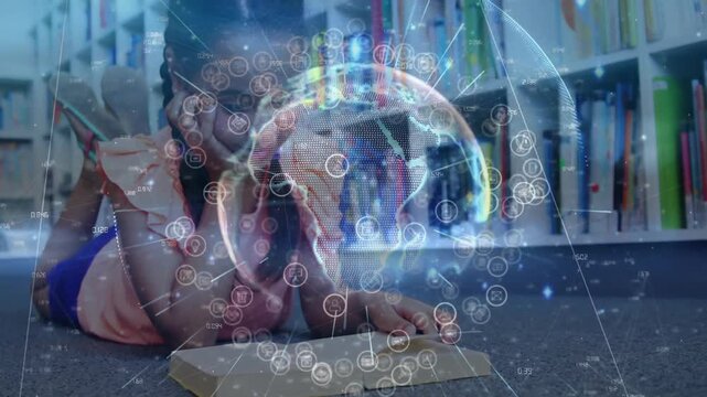 Student lying on library floor tapping tablet creating rotating globe exploring tech network icons