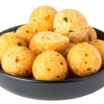 An overhead shot of the complete tuwo shinkafa and miyan kuka meal, showcasing the traditional presentation, isolated on a white background