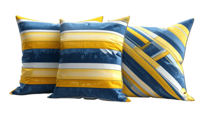 Three decorative pillows with blue, yellow, and white striped patterns on black background