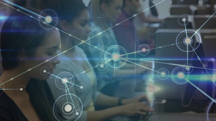 Animation of network of connections over caucasian female doctor using tablet - Powered by Adobe