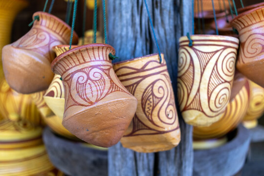 Ancient handmade pottery from Ban Chiang, Udon Thani, Thailand, showcasing traditional earthenware craftsmanship, cultural heritage, archaeology, and Southeast Asian history.