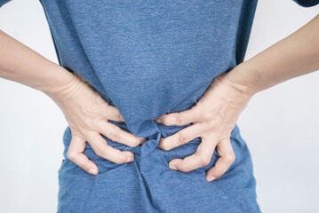 woman suffering from backache on white background. Health care concept.