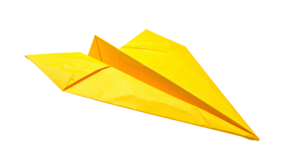 A bright yellow paper airplane isolated against a black background, slightly angled