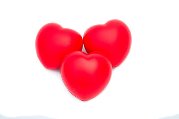 Red heart shape expressing love and care, minimal design, isolated on white background.