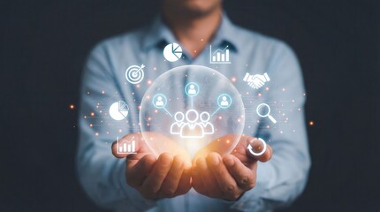 Professional holding a glowing global network sphere with business icons depicting data analysis collaboration and strategic planning in a dim digital environment with a 